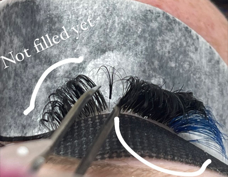 A lash fill half done: the artist marked the part not filled yet